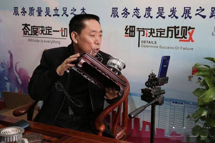 李三信代身残志坚电茶炉成就“精彩人生”